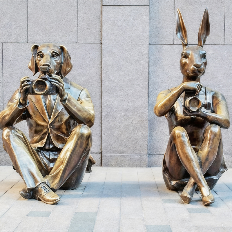 Socha s tématem „fotograf zvířat“.